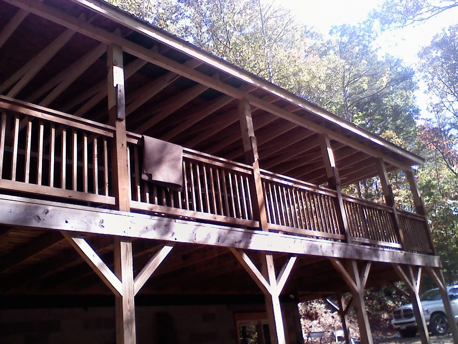 Timber framing under a new elevated porch and deck — Roof Leak Repair in Bradford by Roofing Brothers